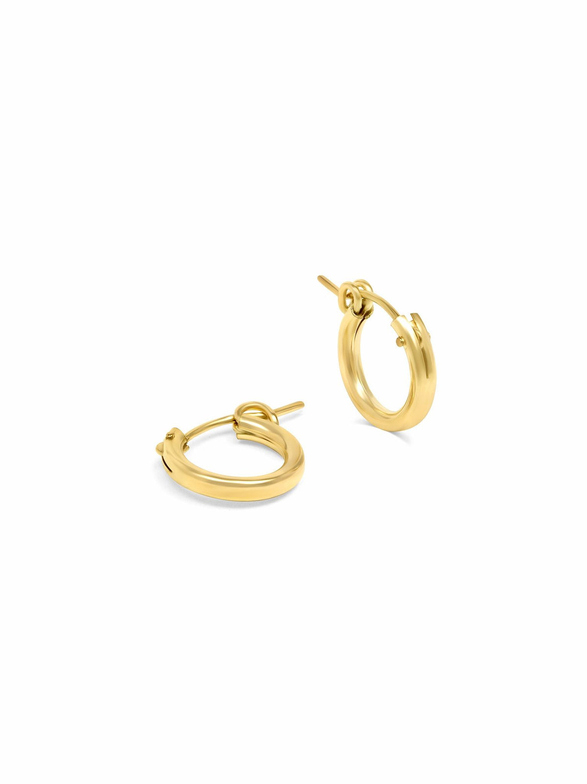 Gold hoop earrings on a white background