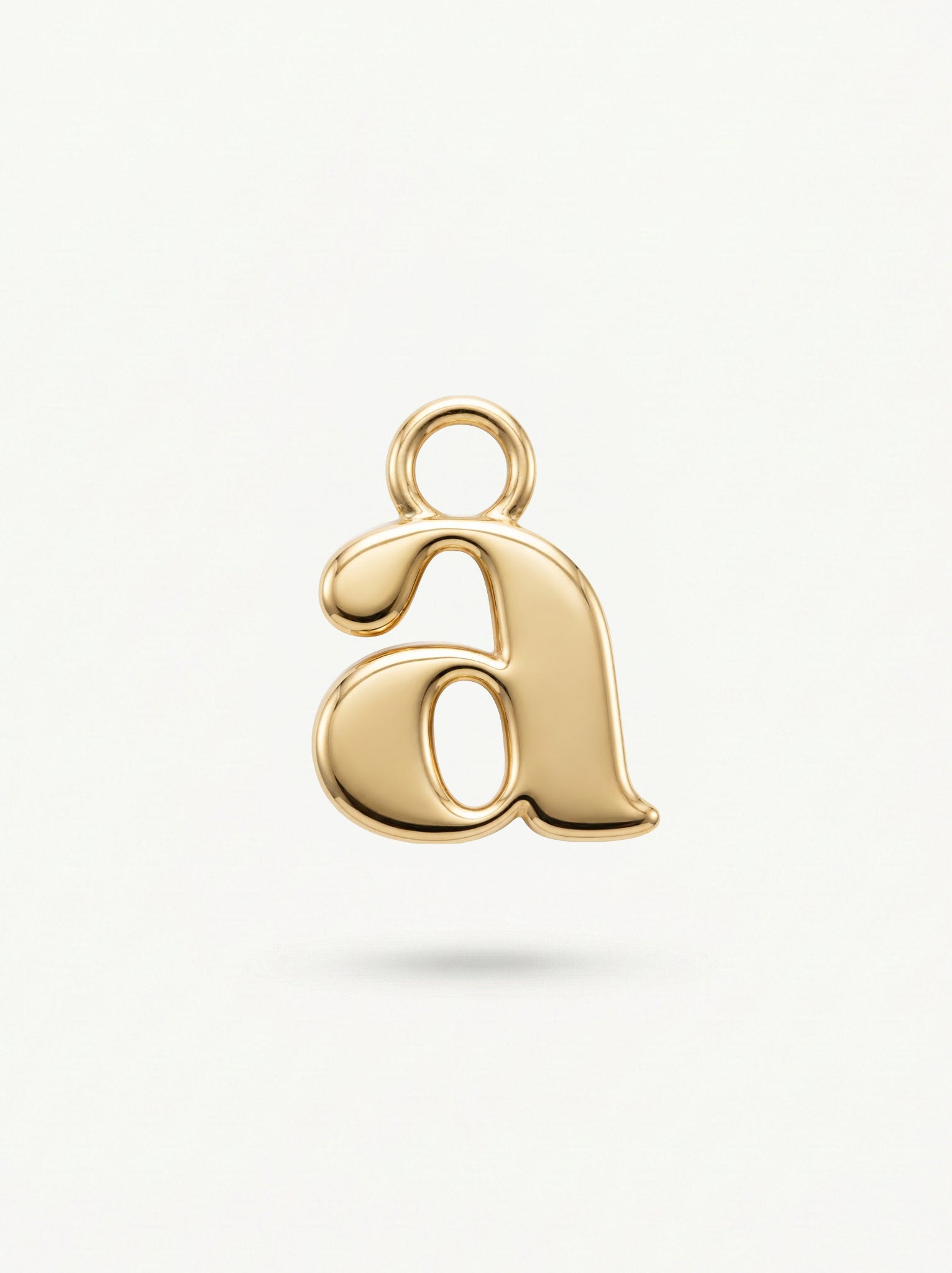Initial Charm Gold Vermeil; Gold letter 'a' pendant on a light gray background