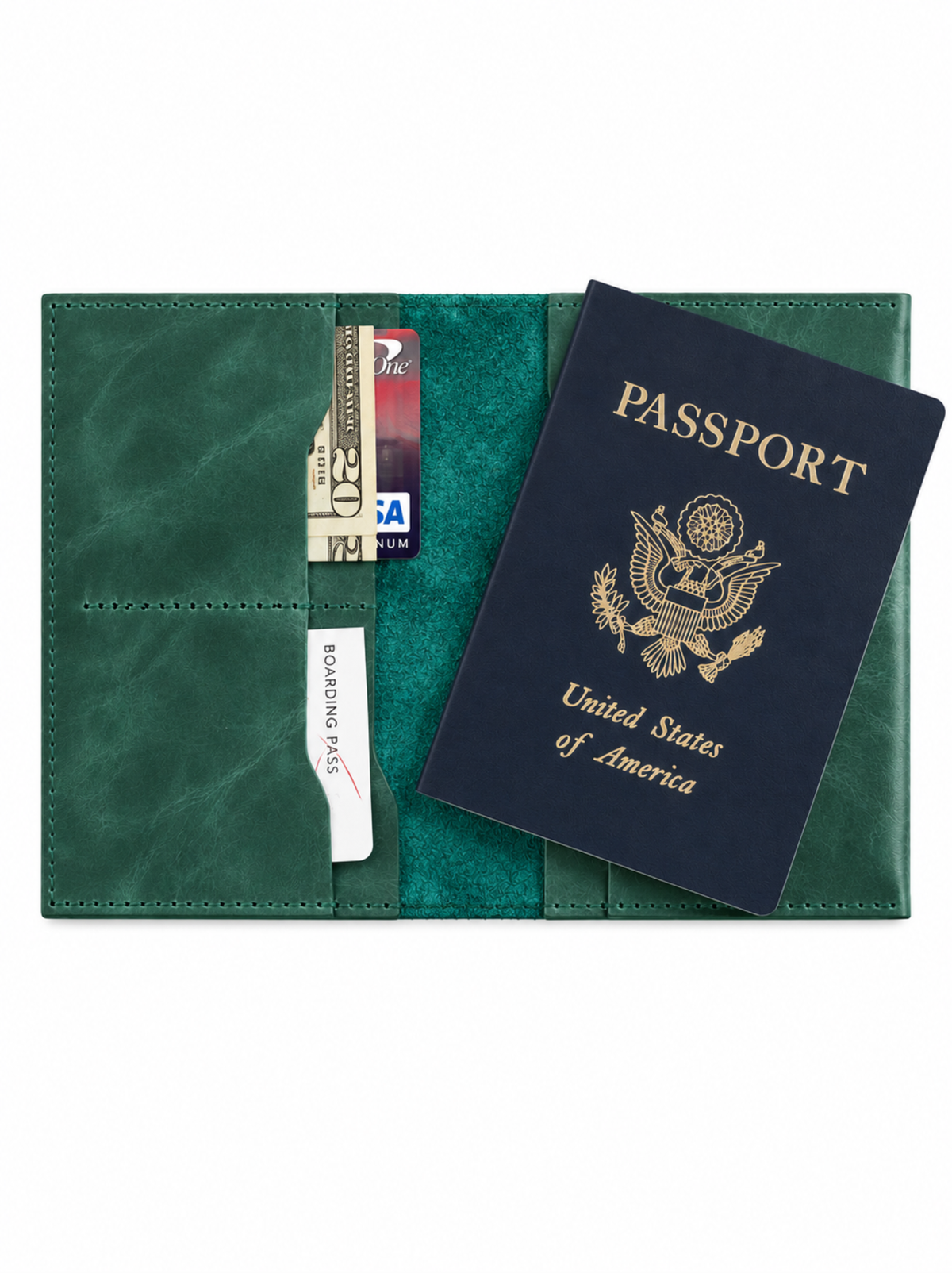 A dark green leather passport holder shown open, with a navy blue United States passport and several cards inserted into its slots, photographed on a plain white background. #Color_Juniper