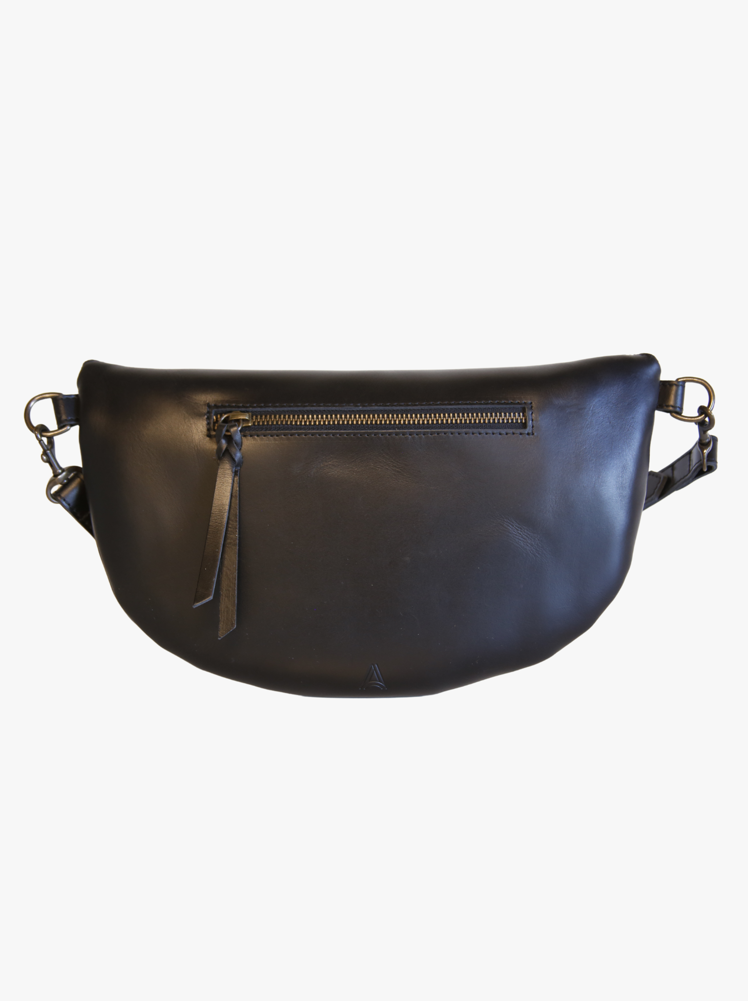 Back of black leather belt bag with exterior zipper pocket with leather zipper pull and brand mark on white background. #Color_Black