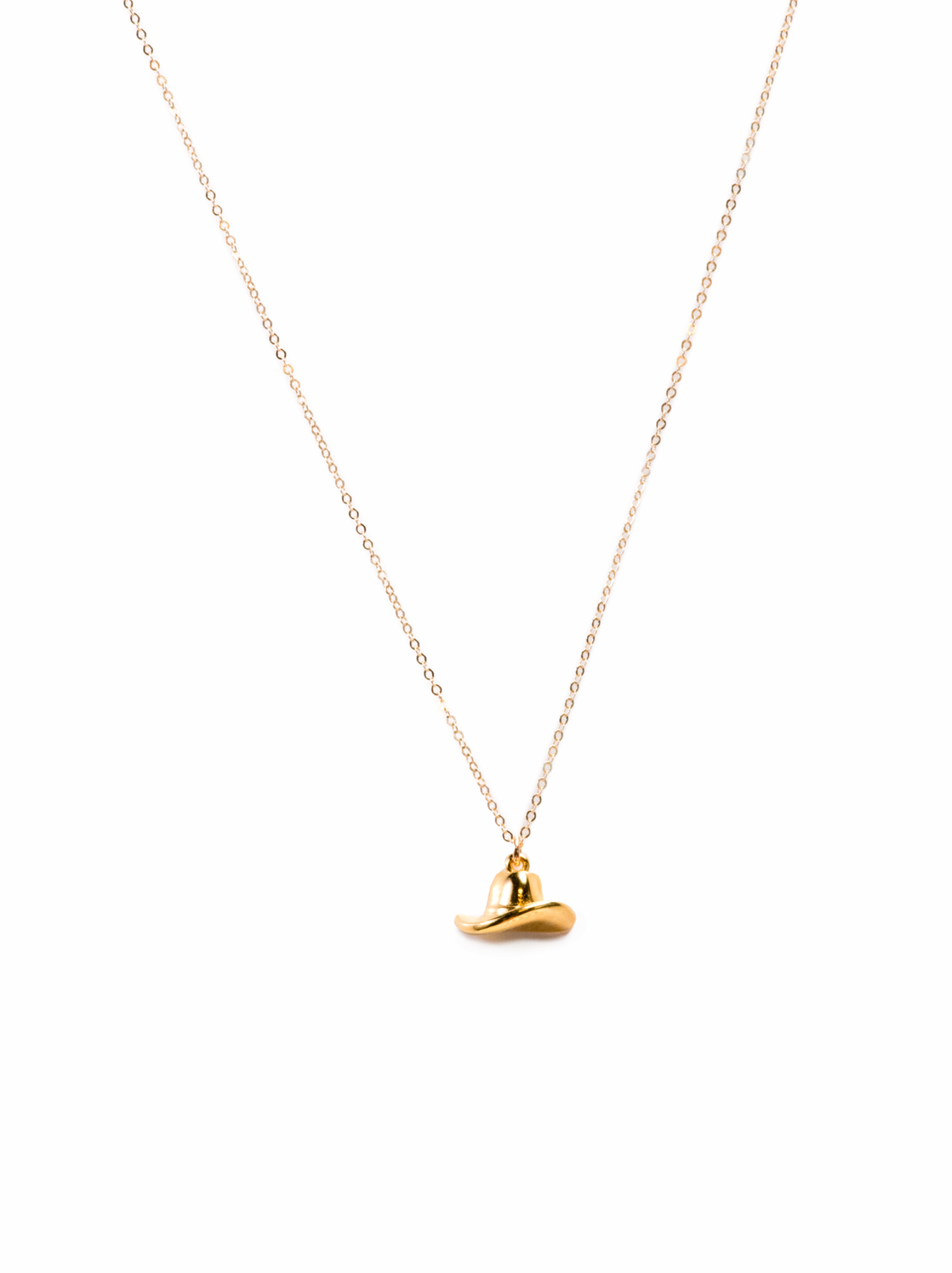 Gold necklace with a small cowboy hat pendant on a white background
