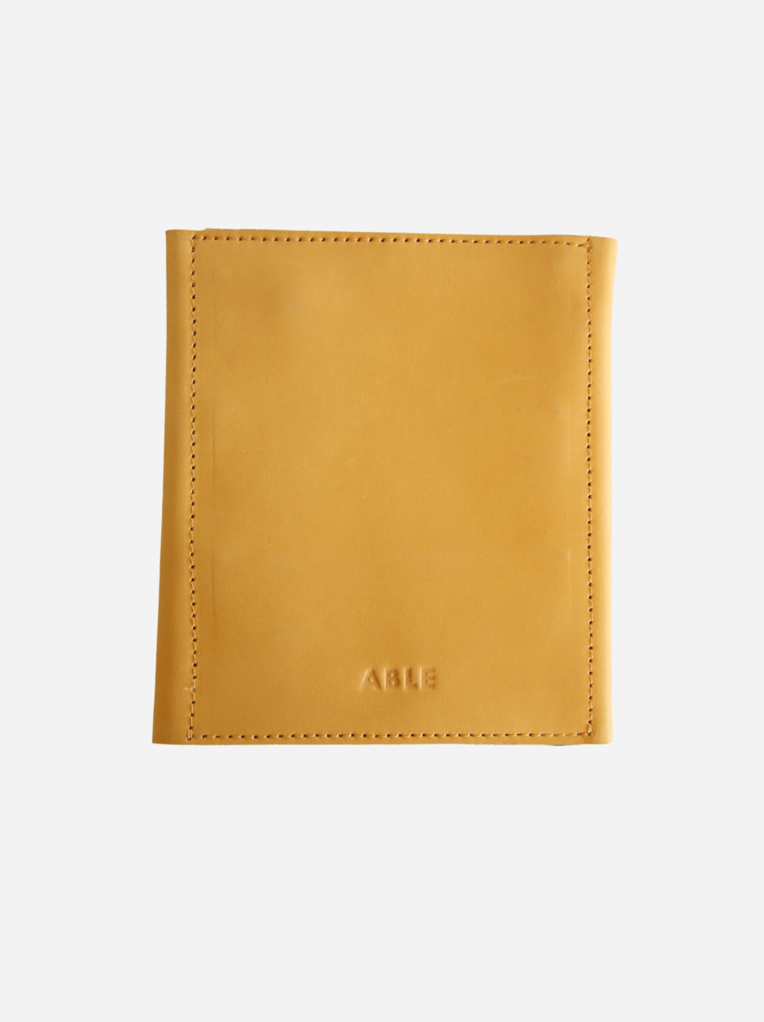 Back of jewelry snap case with ABLE logo at bottom. #Color_Cognac