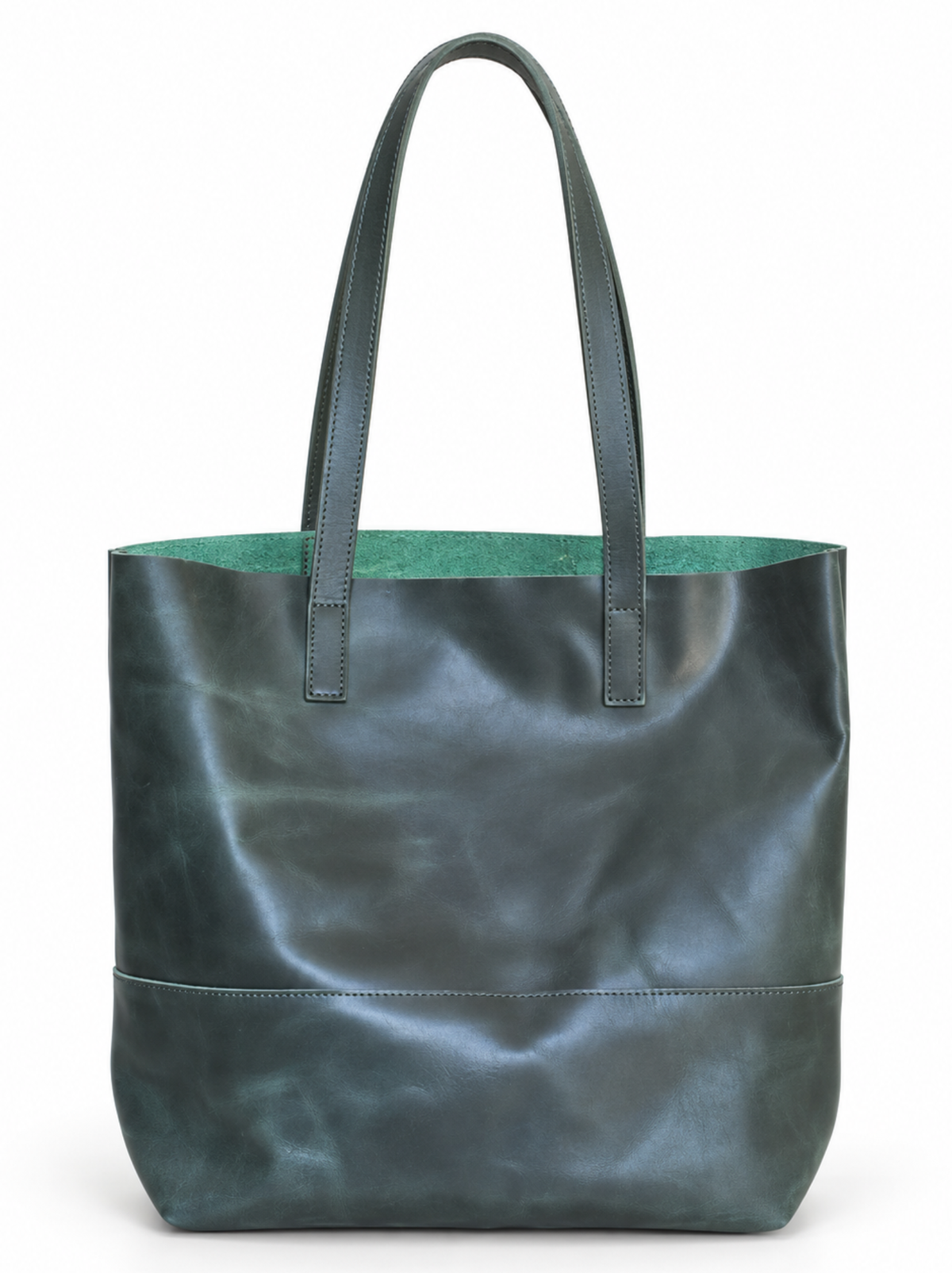 A green leather tote bag with dual shoulder straps photographed against a plain white background. #Color_Juniper