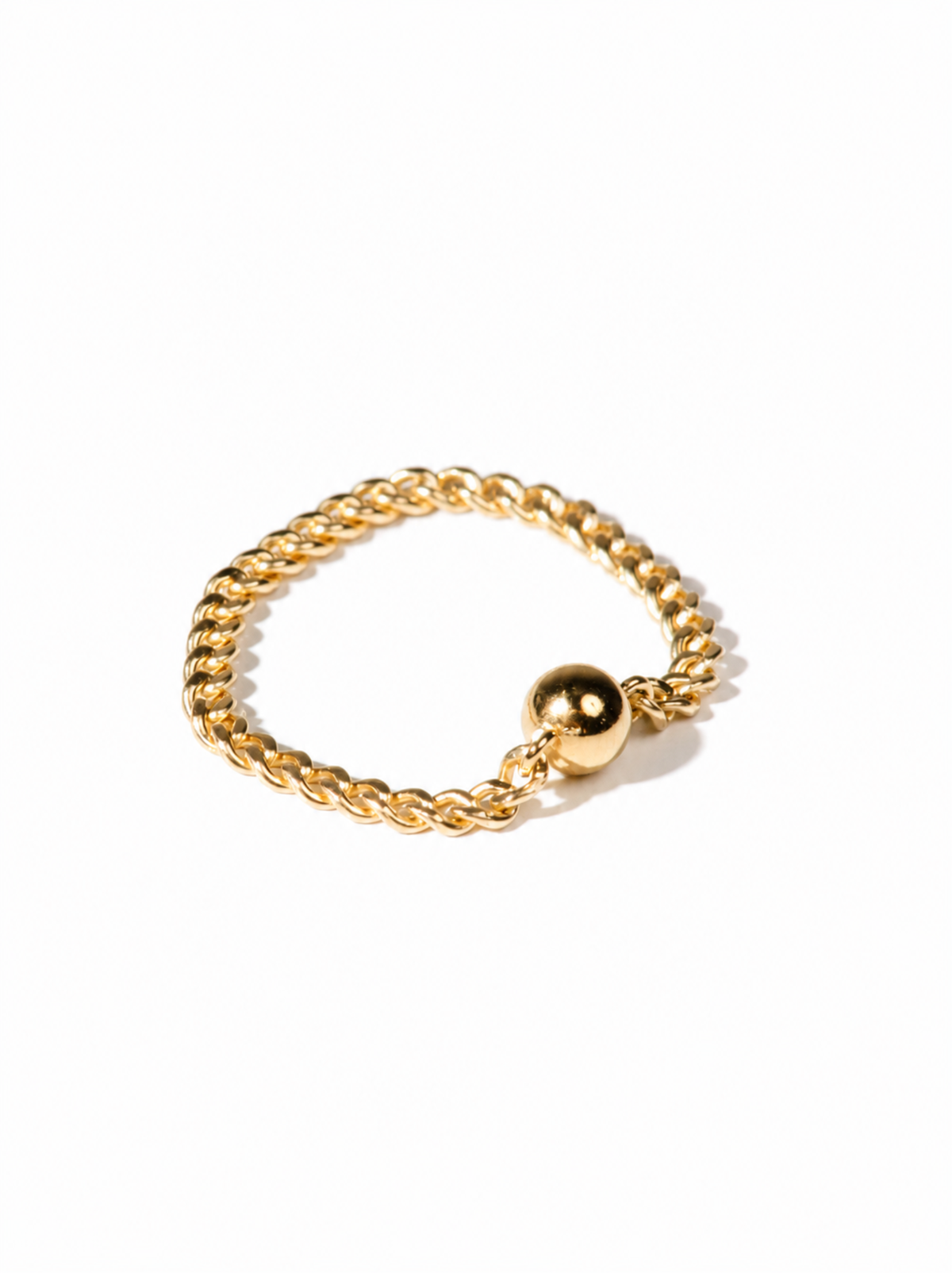 A gold chain ring with a ball bead accent on a white background.