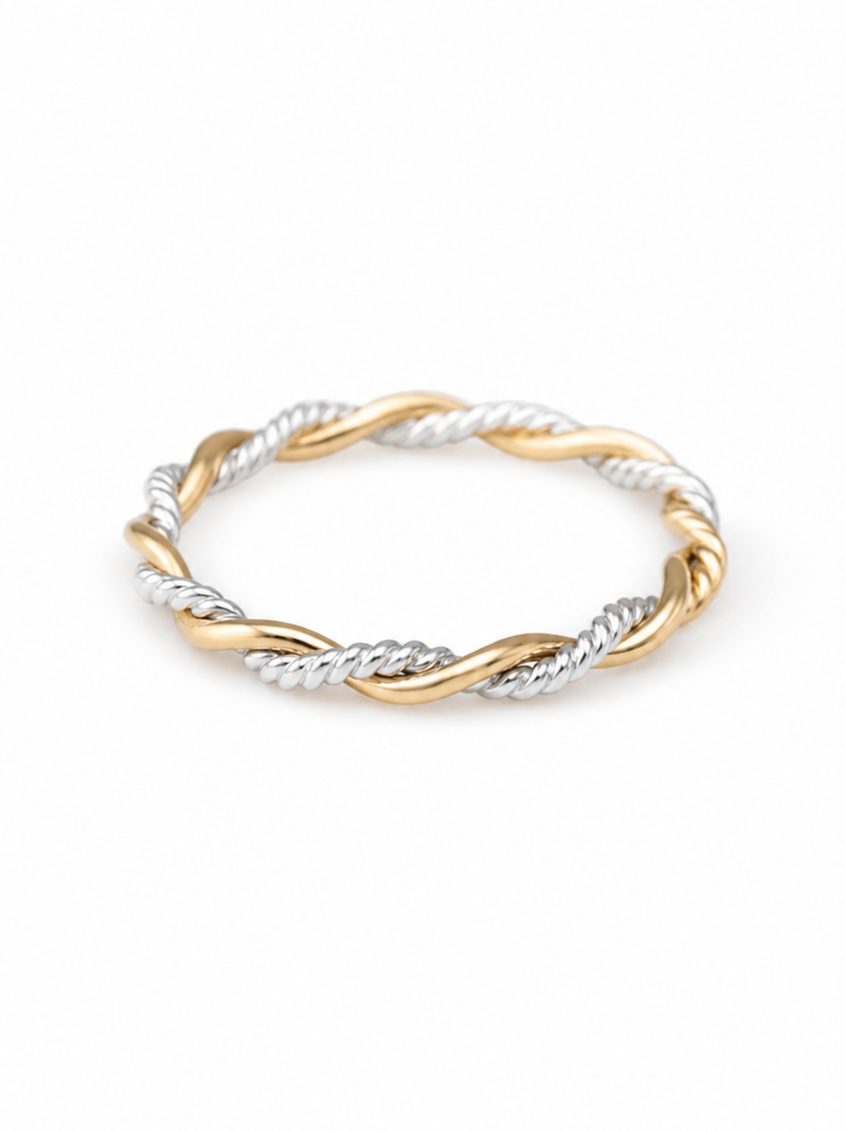 Two-tone gold and silver twisted ring, one solid gold band and one silver twisted texture band, on a white background.