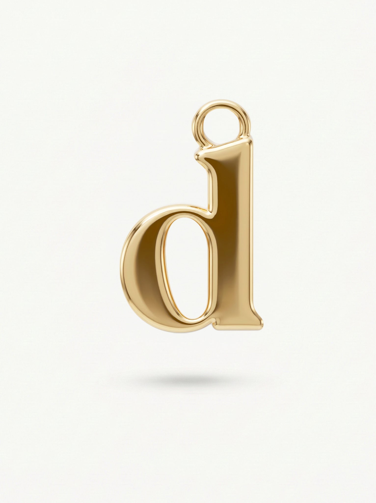 Initial Charm Gold Vermeil; Gold letter 'd' pendant on a white background