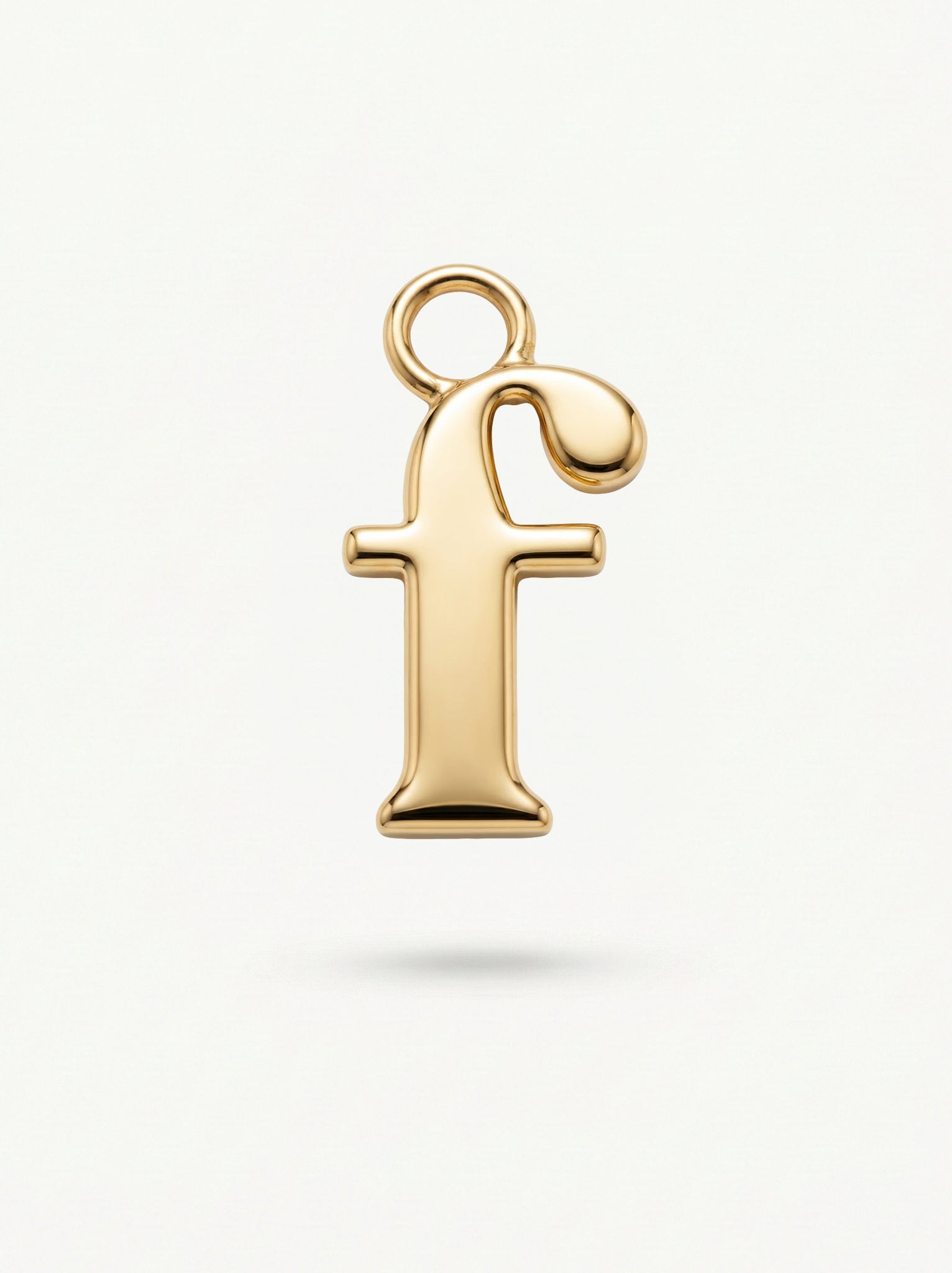 Initial Charm Gold Vermeil; Gold letter 'f' pendant on a white background