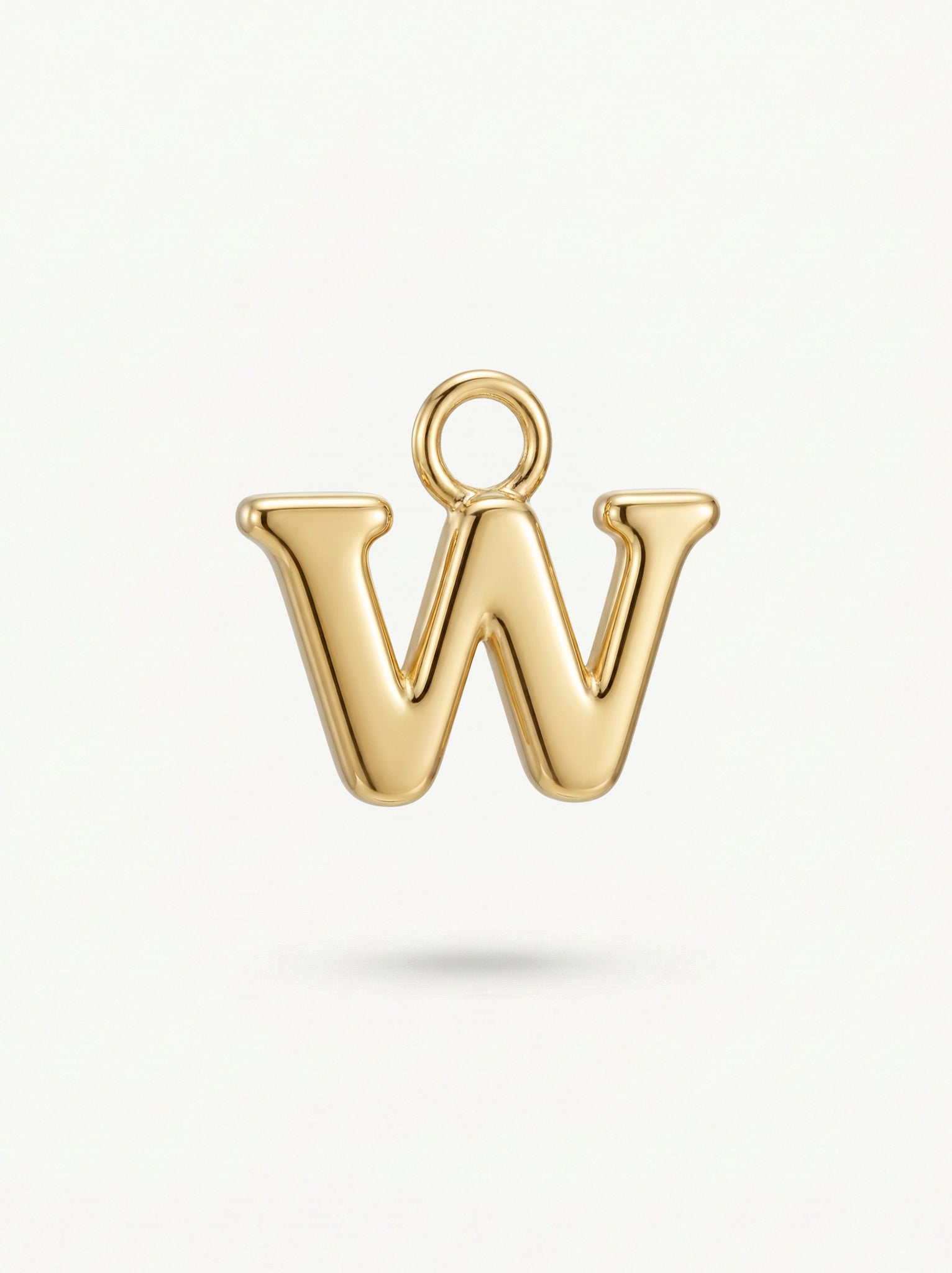 Initial Charm Gold Vermeil; Gold letter 'W' charm on a light background