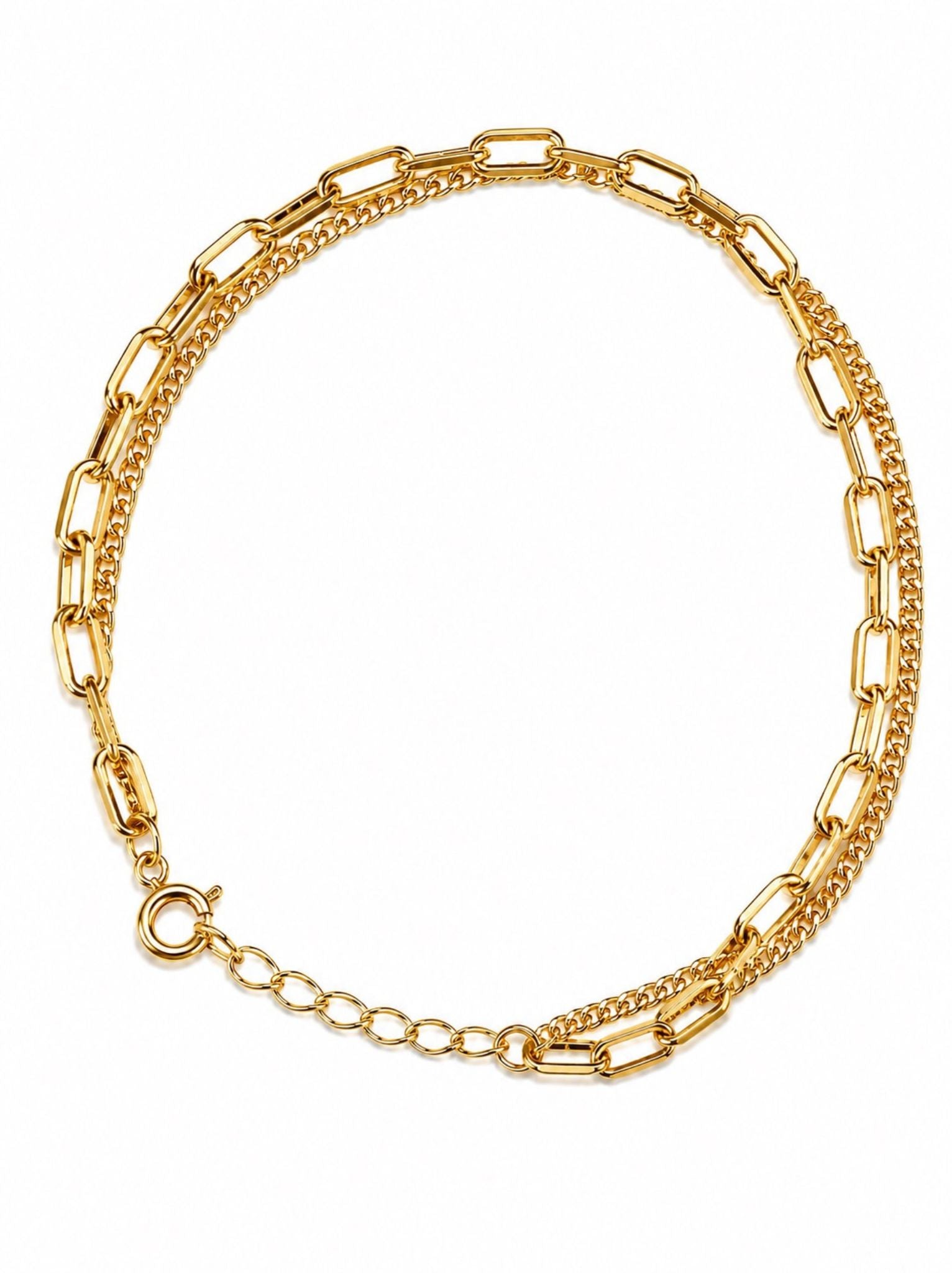 Gold two layered chain bracelet with a clasp and extender on a white background.