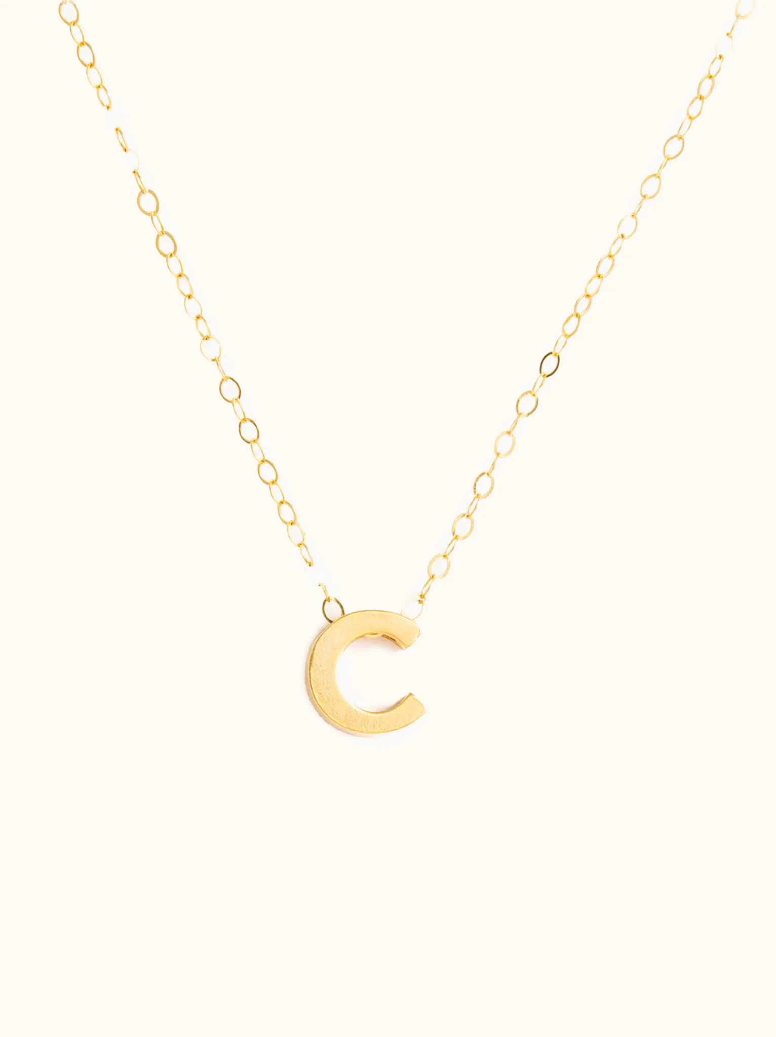 Letter Necklace with a single initial pendant in letter 'C' placed on a white background.